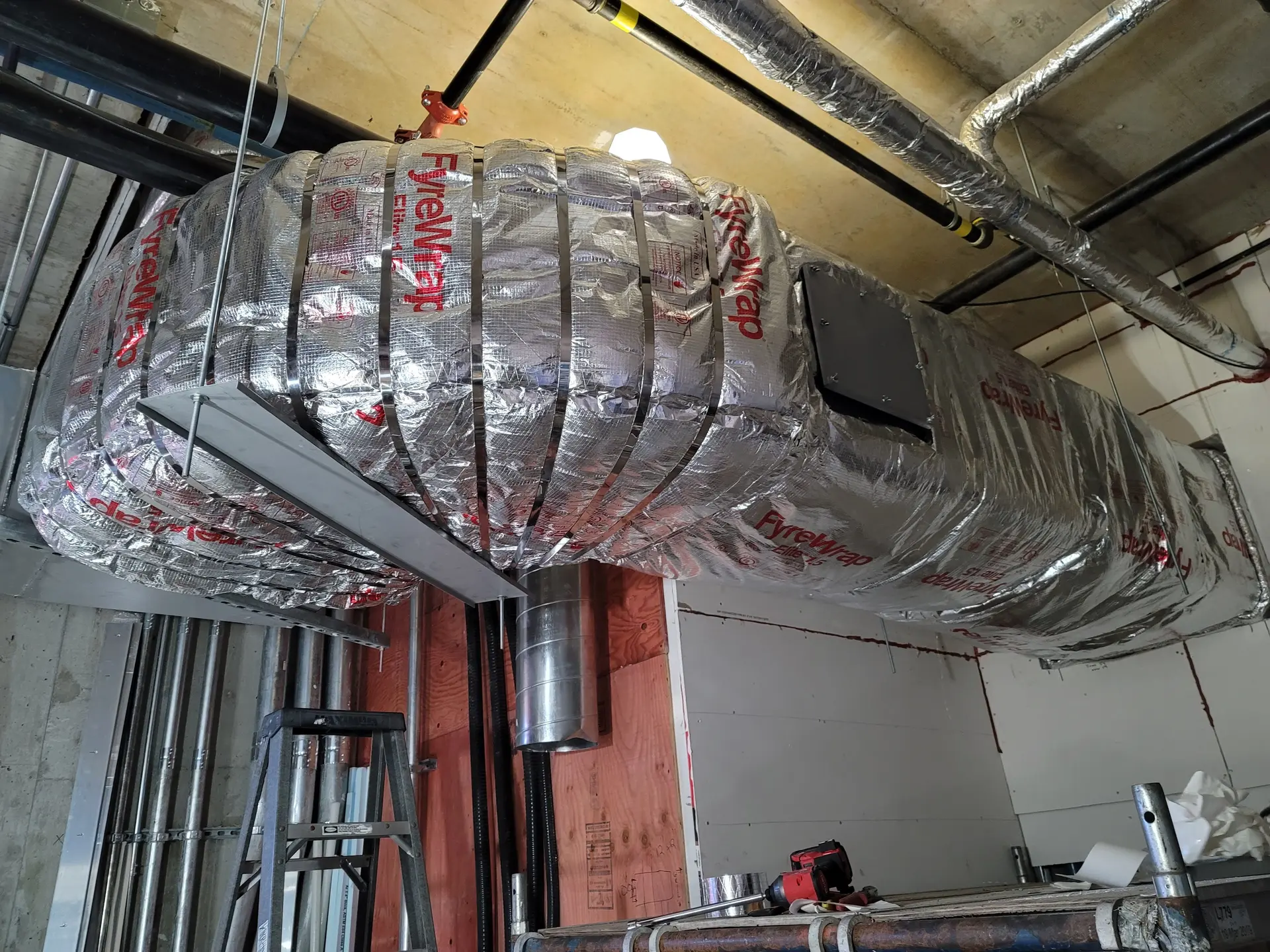 Fyrerap round duct elbow insulated