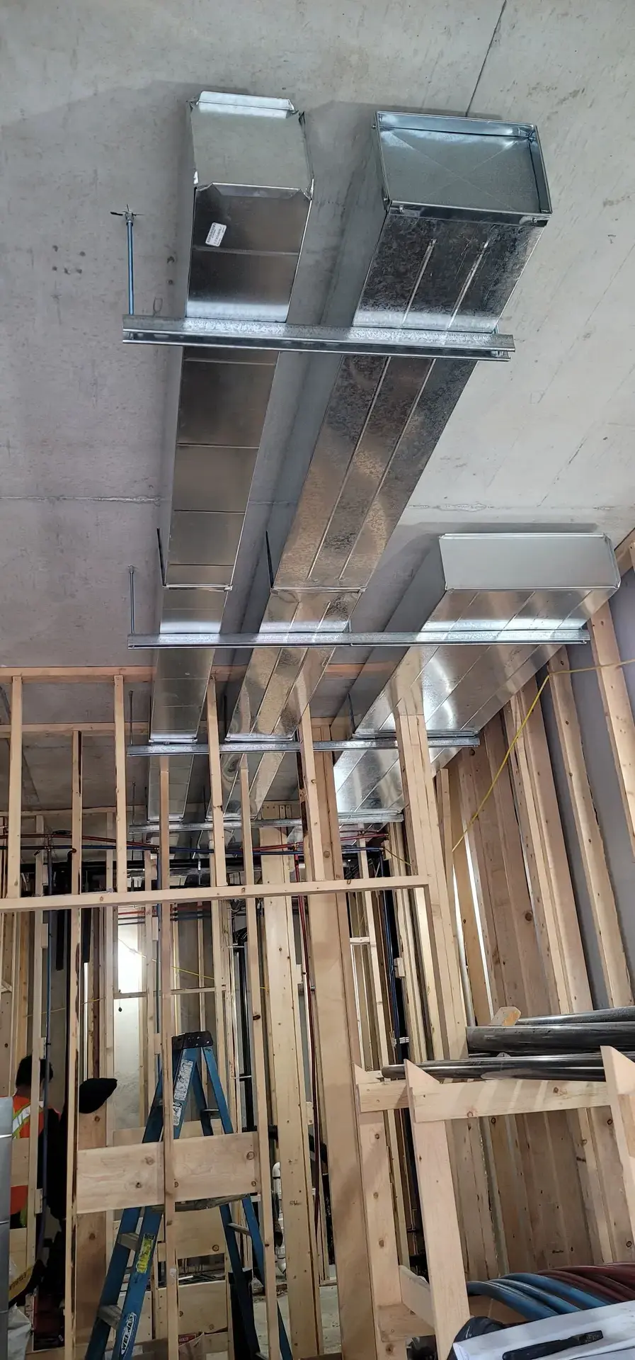 Sheetmetal ductwork concrete wall framing